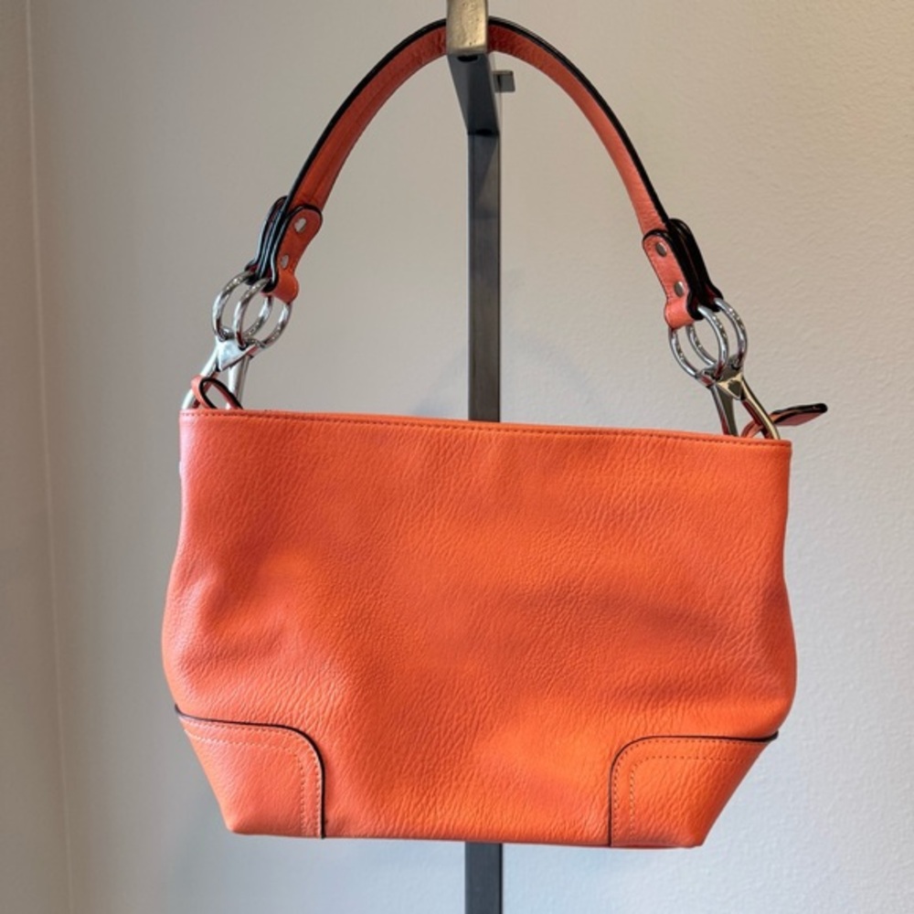 Orange faux leather shoulder bag with removable strap